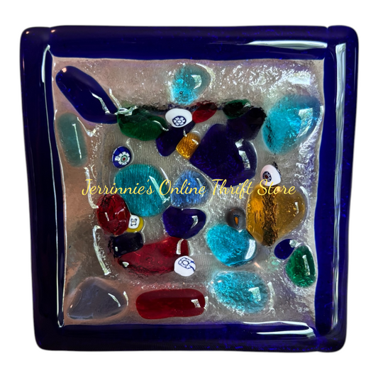 Decorative glass plate with colorful beads and 'Jerrinnies Online Thrift Store' branding.