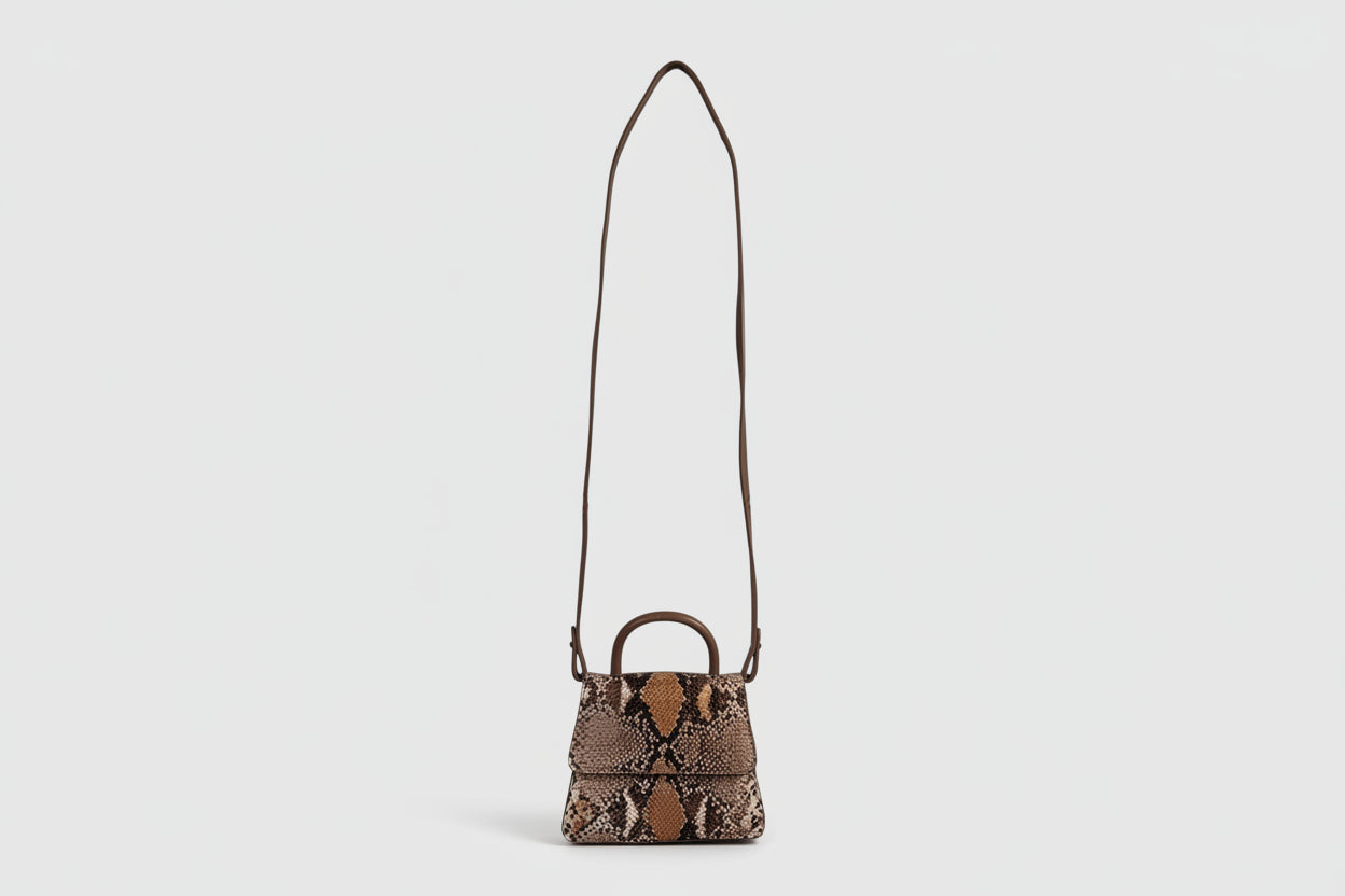 Snake print handbag with a shoulder strap  at Jerrinnie's Online Thrift Store
