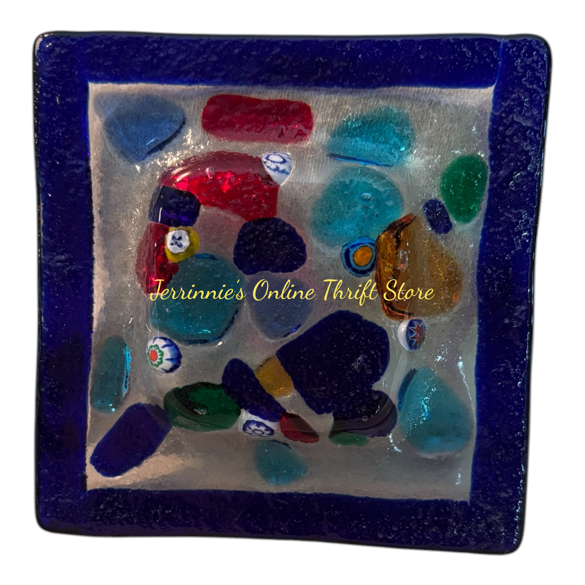 Decorative glass plate with colorful sea glass pieces and a blue border, featuring 'Jerrinnie's Online Thrift Store' text.